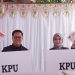 Partisipasi Aktif: Wakil Bupati Kukar dan Istri Gunakan Hak Pilih di TPS 13 Samboja