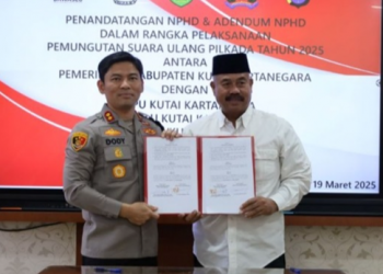 Edi Damansyah Resmi Tandatangani NPHD PSU, Tegaskan Komitmen Pembiayaan Pilkada Ulang 2025